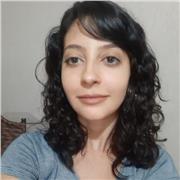 Professor de Português ensina para aluno de ensino fundamental e médio